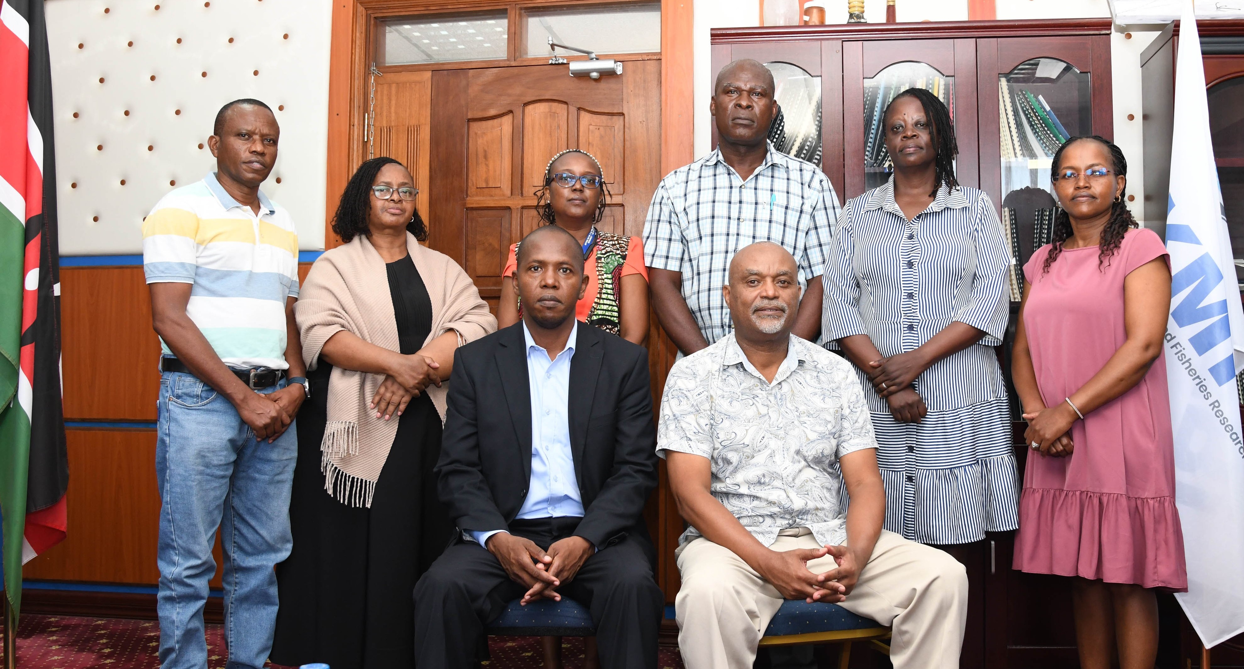 Dr. James M. Mwaluma (Right) handing over to Dr. Paul S. Orina